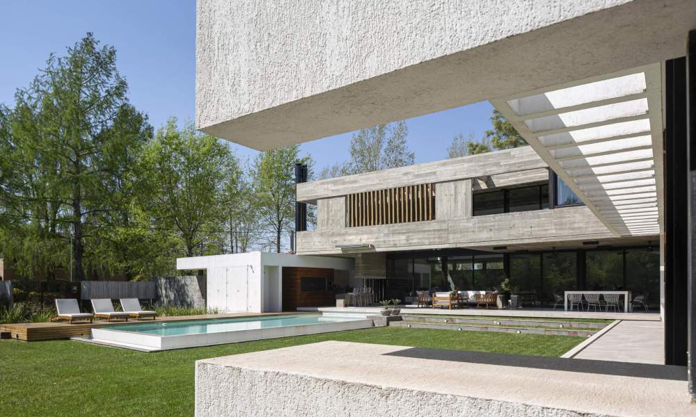 Casa EG: Diseño Innovador en San Jorge que Resalta la Funcionalidad y la Estética