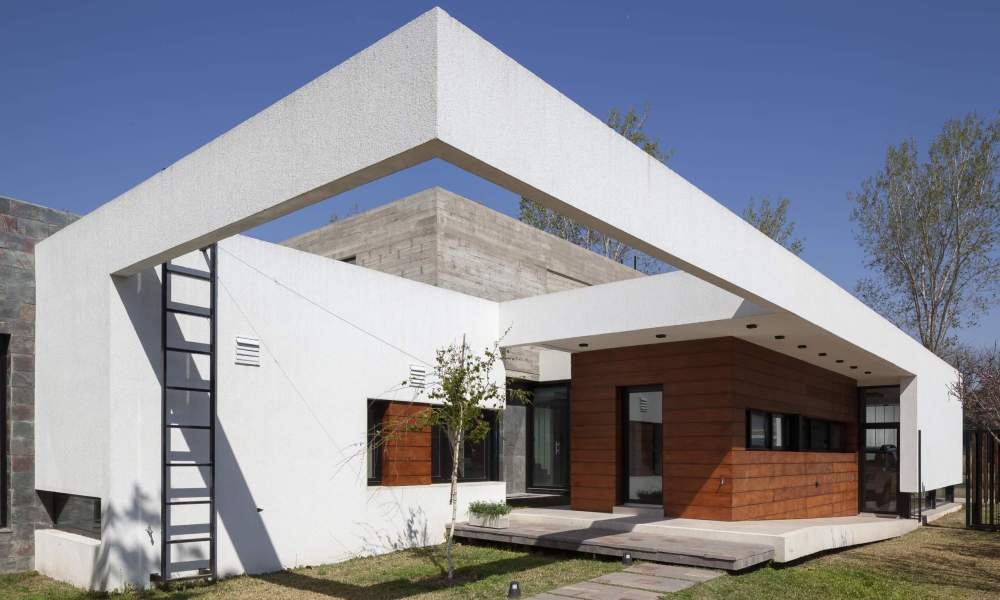 Casa EG: Diseño Innovador en San Jorge que Resalta la Funcionalidad y la Estética